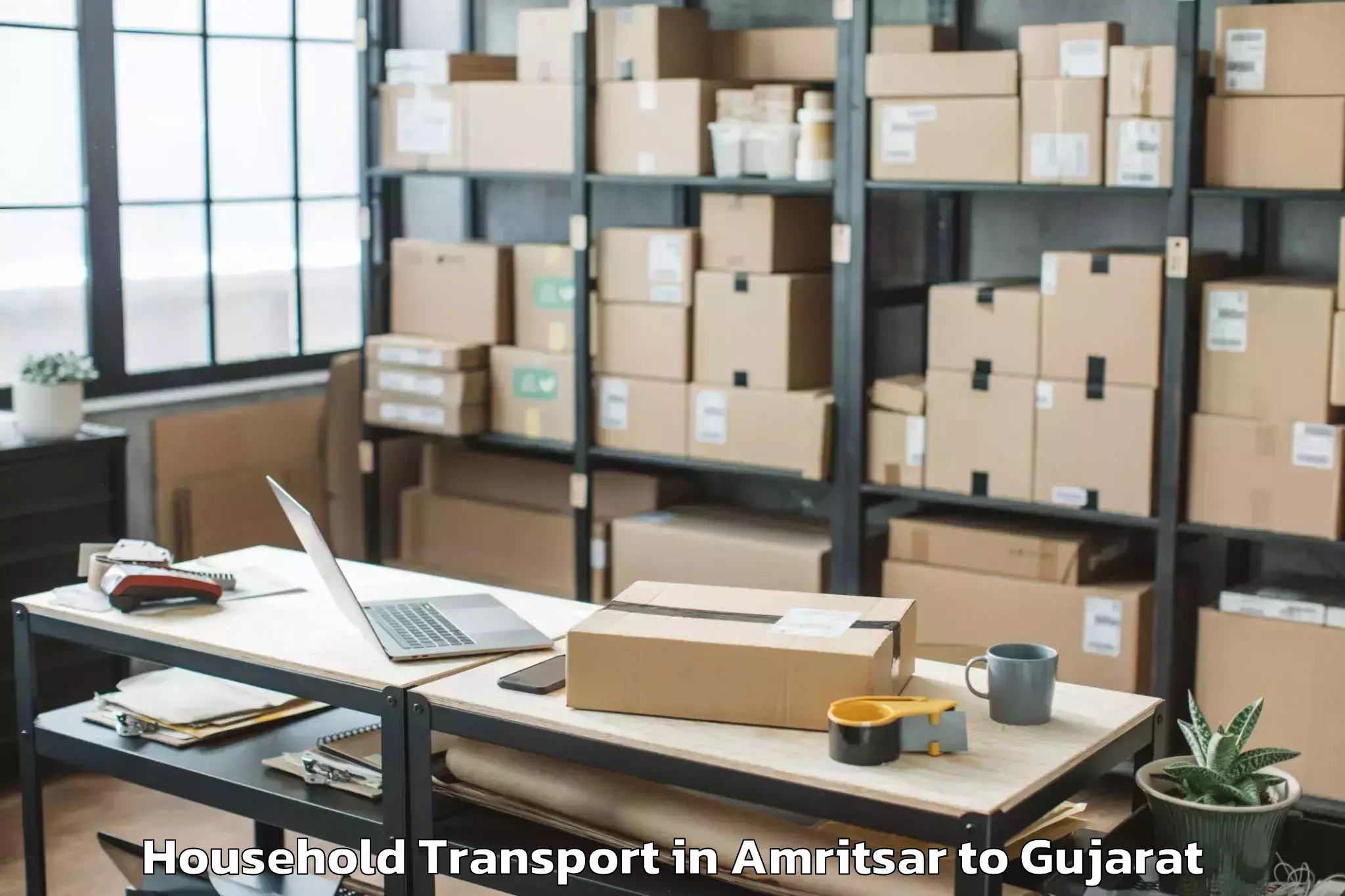 Book Amritsar to Crystal Mall Rajkot Household Transport Online